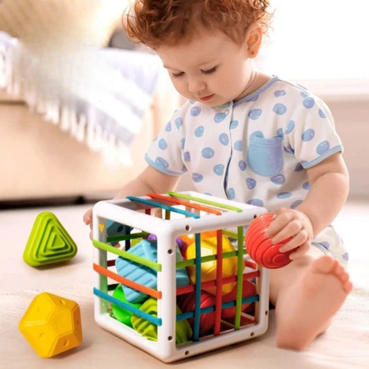 MagiCube™ Baby Activity Cube – Montessori Shape Sorter with Elastic Bands, BPA-Free
