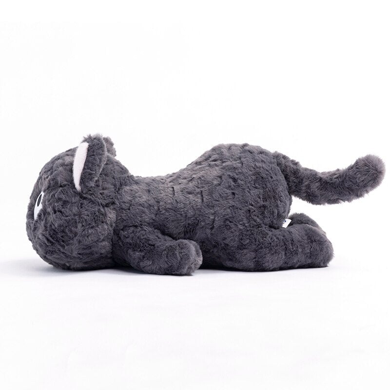 Jiji the Fluffy Black Cat Plushie Laying Down