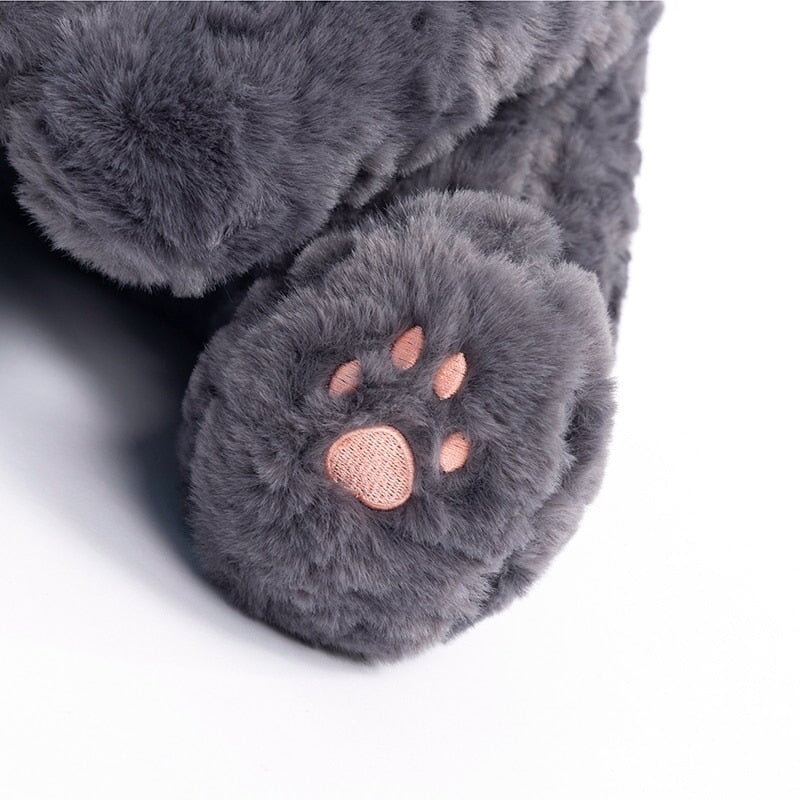 Jiji the Fluffy Black Cat Plushie Laying Down